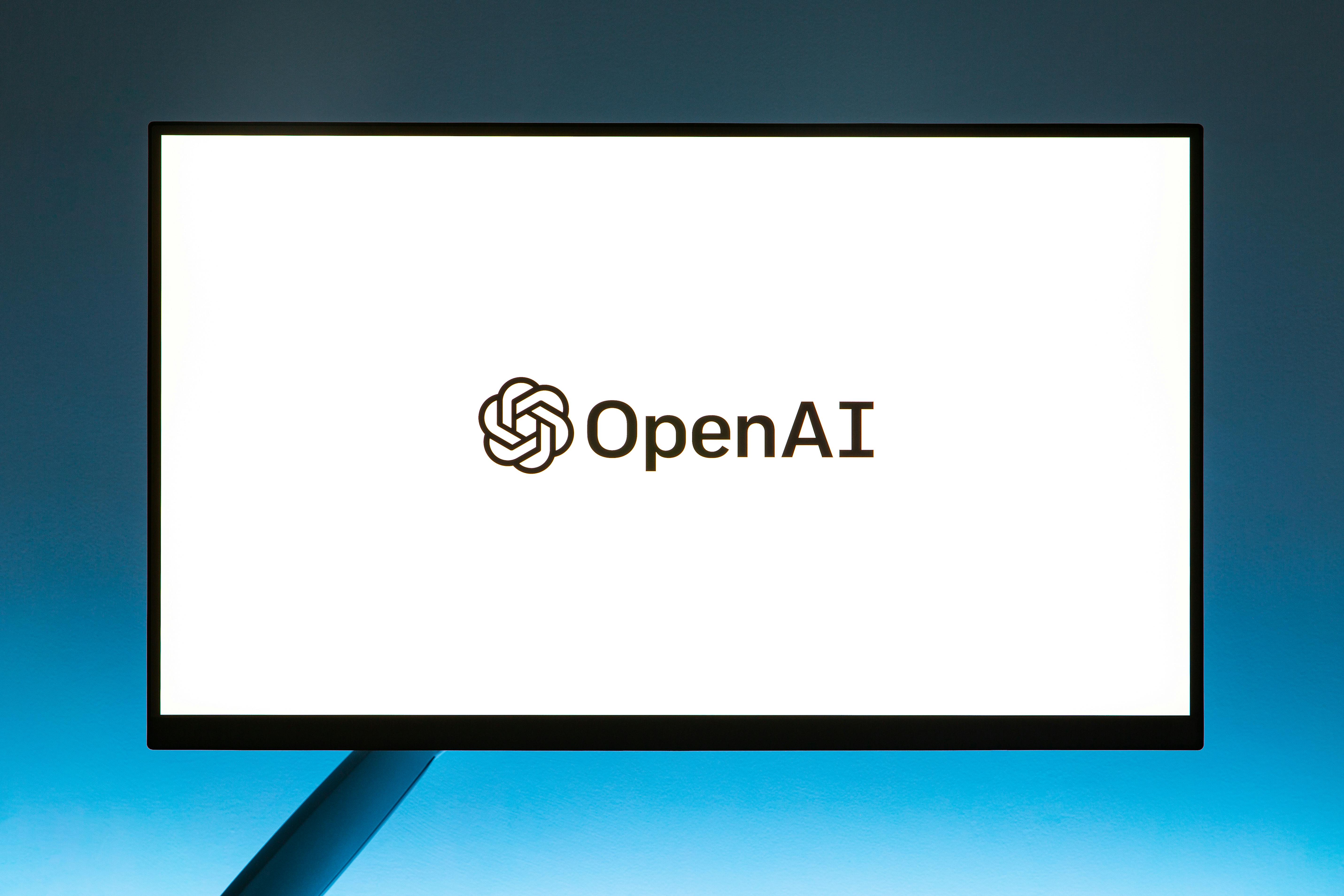 Computer Monitor with OpenAI Website Loading Screen